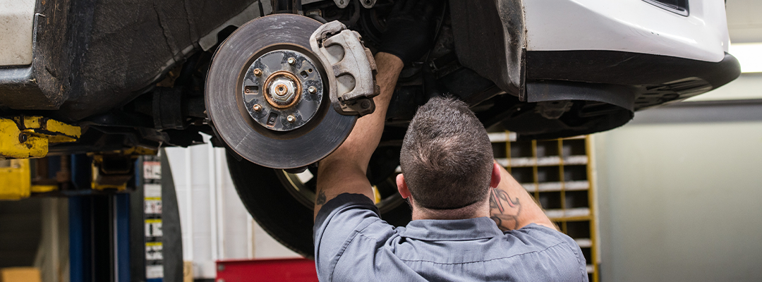 Technician fixing wheel