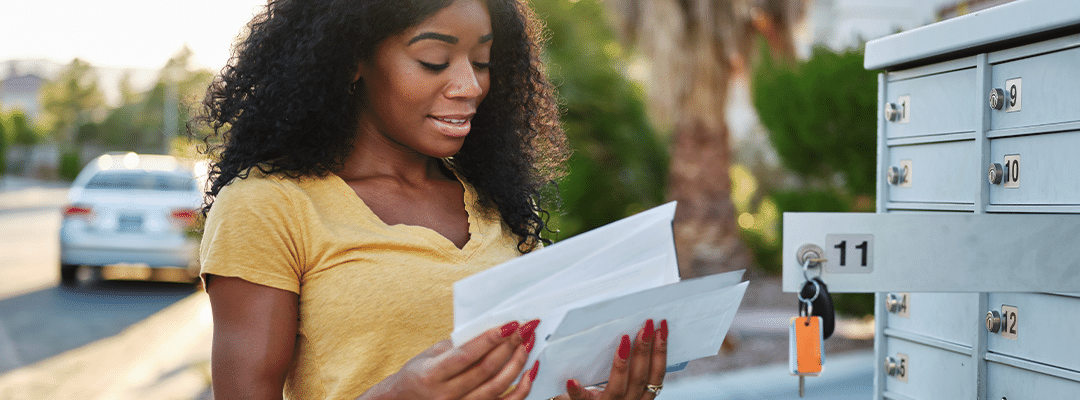 a woman checking her mail